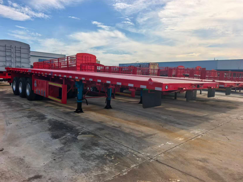 Fabrikmaßgeschneiderter 12,5-Meter-3-Achs-Geradträger-Tieflader-Sattelanhänger Schwerlast-Container-Transportanhänger zu verkaufen